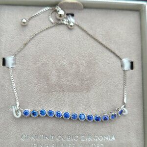 NWT expendable Bracelet: Genuine Cubic Zirconia on Fine Silver plated chain.